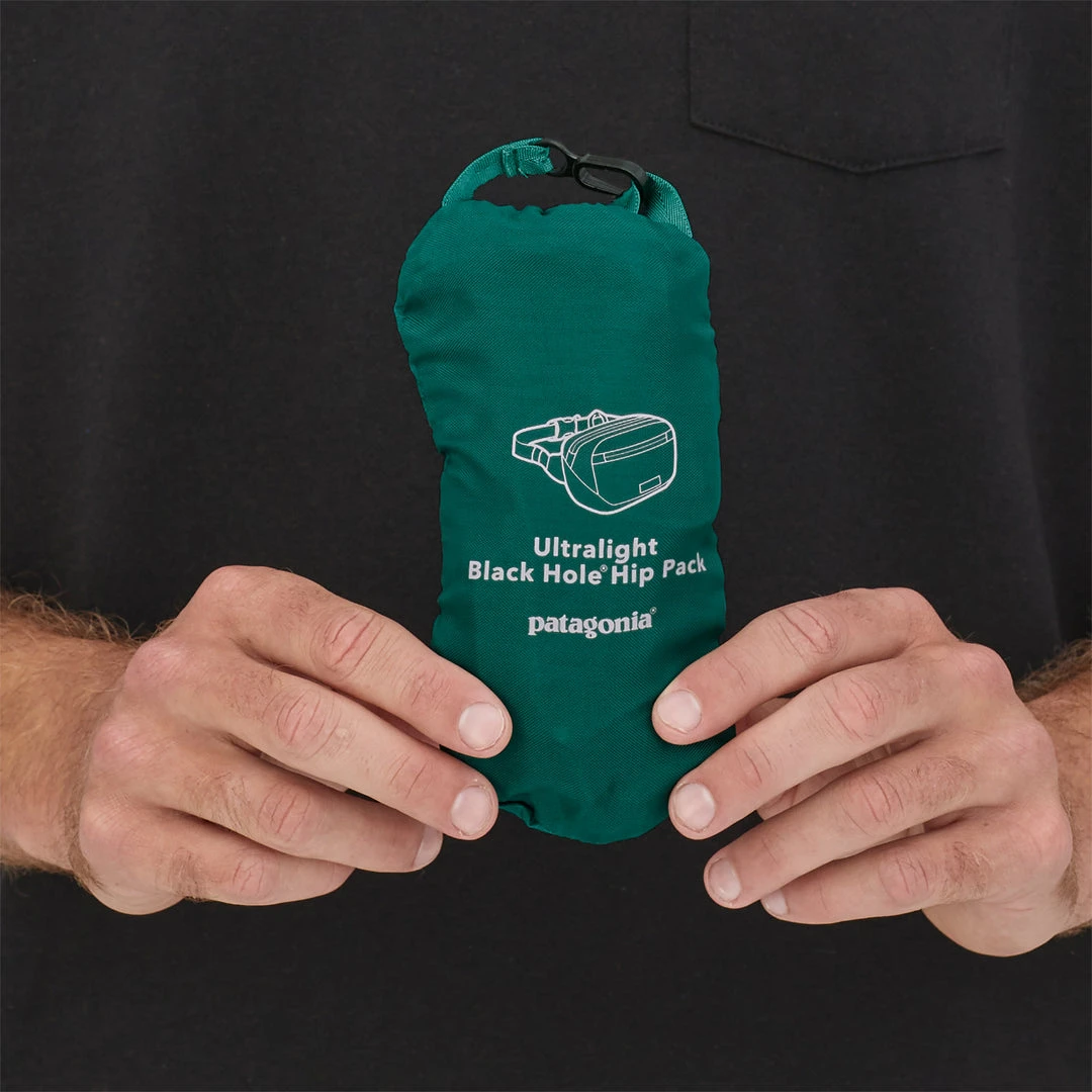 Patagonia Ultralight Black Hole Mini Hip Pack 1L - Tigerlily Orange | Compact & Durable Waist Bag for Men & Women 6 Patagonia Ultralight Black Hole Mini Hip Pack 1L - Tigerlily Orange